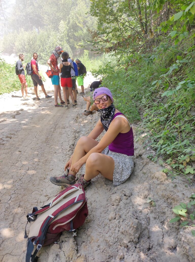 Woman taking a break from hiking in the desert in Serbia