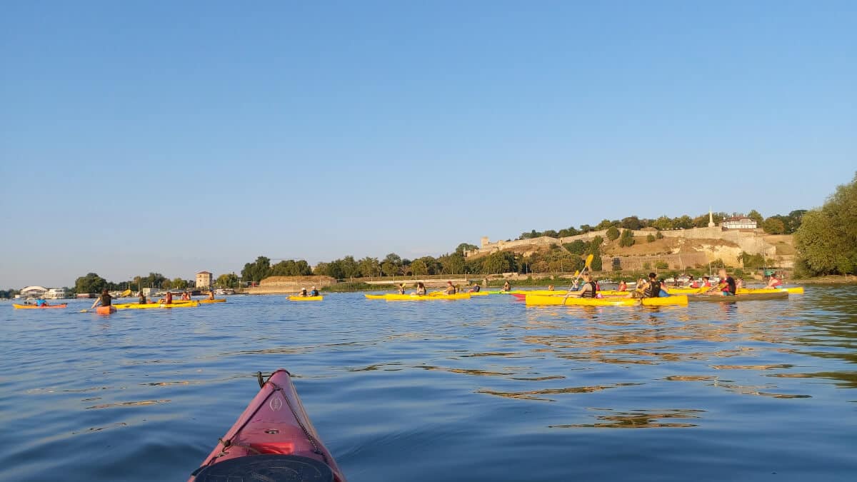 People kayaking on Danube bank close to the Kalamegdan fortress