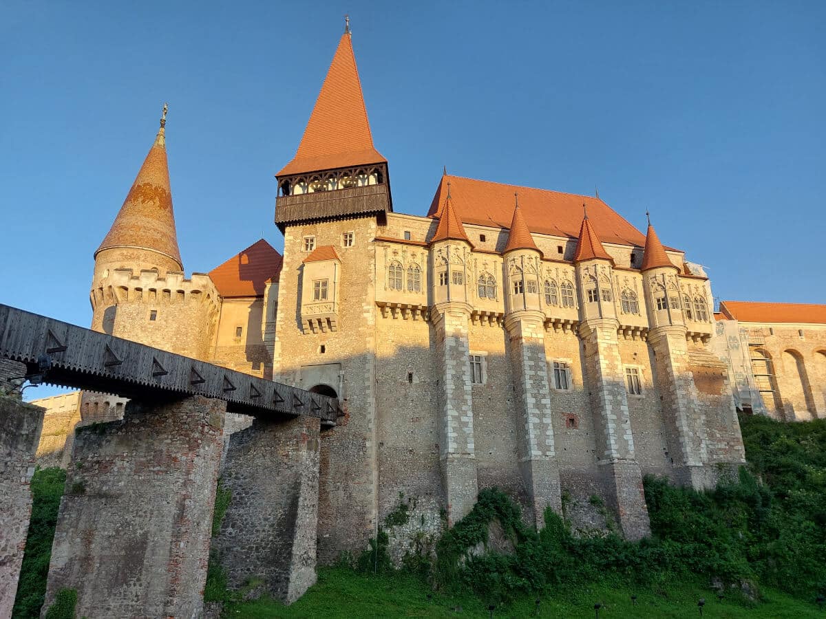 View of the Corvin's Castle with the sunset