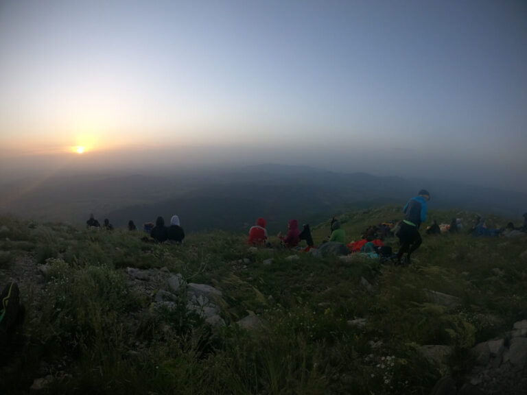 People watching the sunrise on Rtanj in Serbia