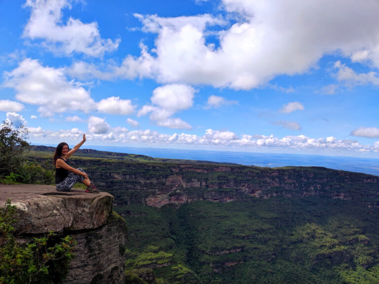 Woman on the top of the fumaca waterfall