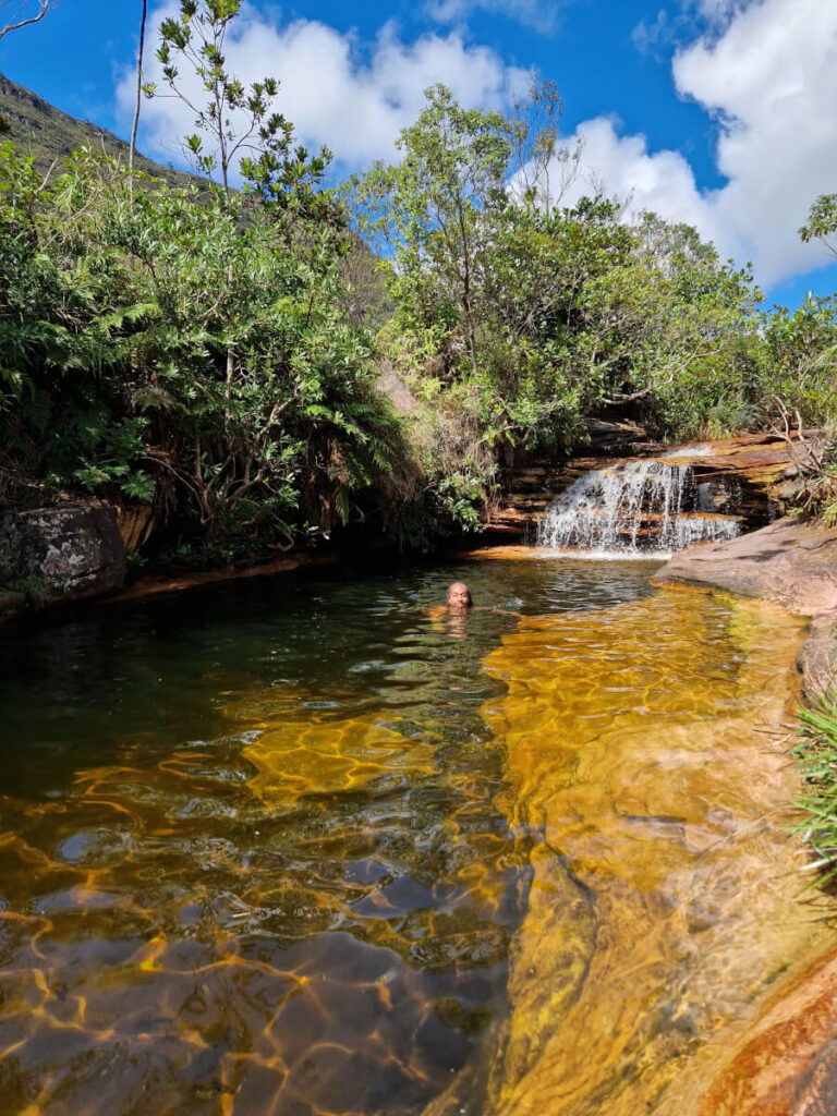 Man in the Aguas Claras waterfall