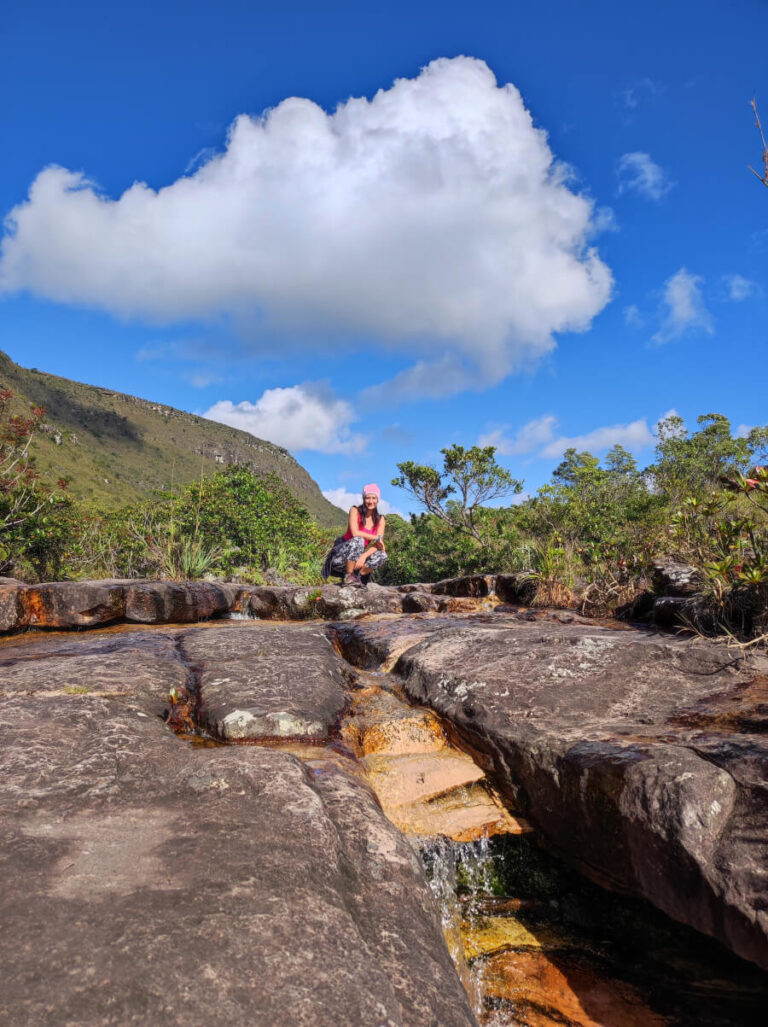 Woman hiking to the Aguas Claras waterfall in Vale do Capao