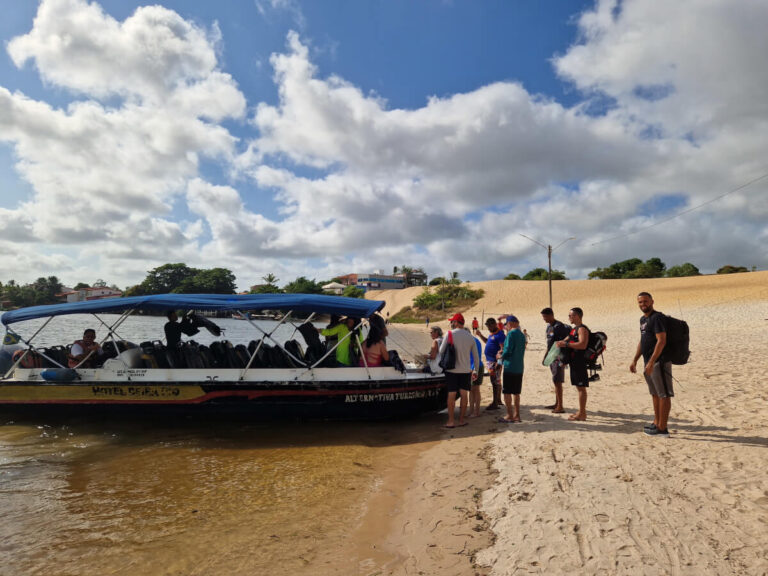 People embarking on a boat in Barreirinhas, Brazil