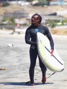 Man surfing in Lobitos, Peru