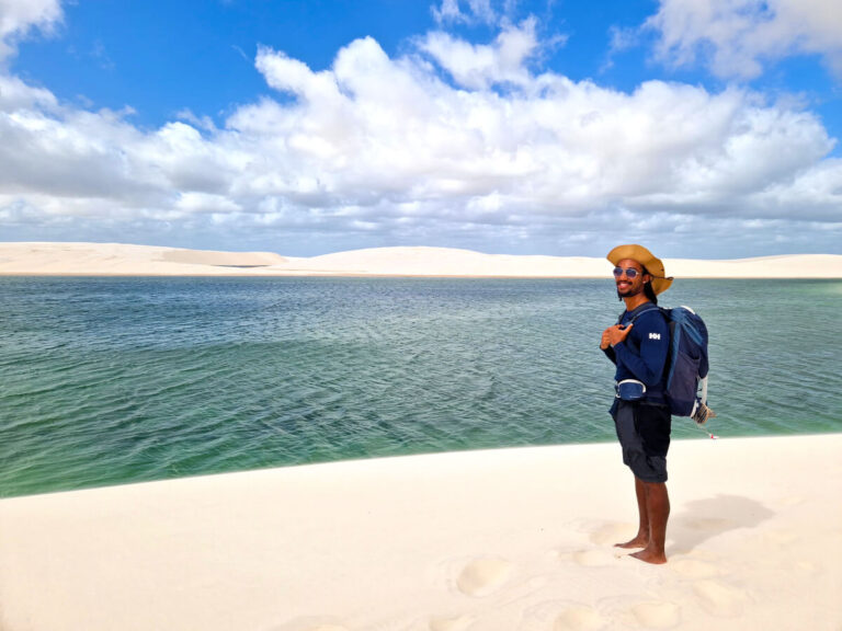 Man hiking on Lencois Maranhenses National Park in Brazil