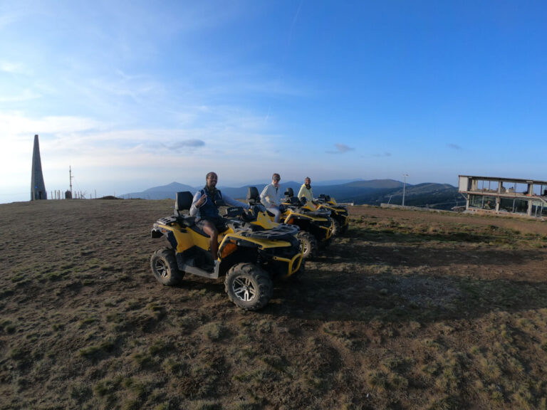 Men on an ATV ride at the top of the Kopaonik mountain in Serbia