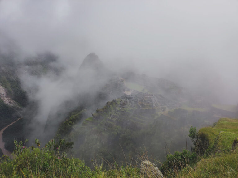 Machu Picchu during the rainy season, covered by clouds